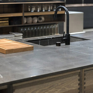 Image of a countertop and wash basin with tap